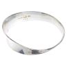 GEORG JENSEN - a silver bangle. Designed as a tapered bangle, with twist highlight. Marker's marks f