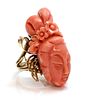 An Asian carved coral ring,