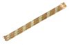 A 9ct three colour gold five row brick link bracelet, by Wristwear, c.1970,