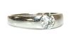 A platinum single stone gypsy or Prussian style ring,