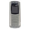 VERTU - a mobile phone. The beige snakeskin case with metal Russian alphabet keypad and metal and sn