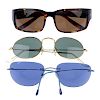 Three pairs of sunglasses. To include a pair of Ray-Ban oval-shape gold-tone rimmed sunglasses, a pa