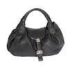 FENDI - a Spy Bag. Designed with a soft black leather exterior, braided handles and trim, engraved s