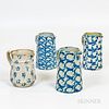 Four Blue and White Sponged Stoneware Pitchers