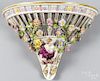 Porcelain wall shelf with a maiden and flowers, 19th c., 8 1/2'' h., 12'' w.