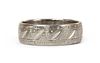LOT WITHDRAWN An 18ct white gold engraved wedding band ring,