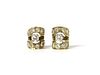 A pair of gold diamond stud earrings,