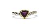 An 18ct gold purple sapphire and diamond ring,