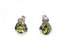 A pair of 18ct white gold peridot and diamond stud earrings,