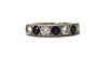 An 18ct white gold sapphire and diamond half eternity ring,