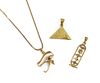 An Egyptian gold pyramid pendant,