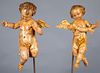 Continental carved and painted cherub figures