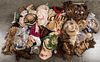 Large group of doll hats and wigs