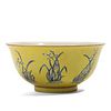 A YELLOW-GROUND FAMILLE-ROSE 'FLOWERS' BOWL