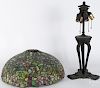 Slag glass table lamp, early 20th c., with a bronzed spelter base and animal paw feet, 23'' h.