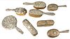 Eight Piece Sterling Silver Repousse Lot, to include seven brushes, two Tiffany & Company plus one hand mirror.
