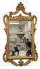 Chippendale style mirror with gold frame, height 54 inches, width 30 inches.