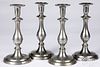 Set of four pewter candlesticks, 19th c.