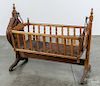 Victorian cherry and pine hanging cradle, 19th c.