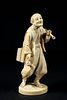 19TH C. JAPANESE IVORY OKIMONO OF MAN WITH PIPE AND CUP