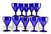 A GROUP OF TEN EARLY 19TH CENTURY BRISTOL BLUE GLASS RUMMER