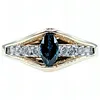 Unique Diamond & "Floating" Sapphire Ring