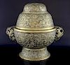 Chinese brass twin-handled censer and cover with embossed floral decoration, applied mark to base, 3
