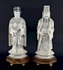 Pair of early 20th century Chinese carved ivory Emporer and Empress figures, he holding a sword, she