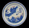 Chinese blue and white dish decorated with figures in a landscape and calligraphy, eight character m