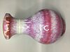A CHINESE FLAMBE BOTTLE VASE, THE RED BODY WITH LAVENDER STREAKS, HEIGHT 32CM