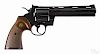 Colt Python revolver, .357 magnum caliber, blued with walnut grips, 6'' round barrel