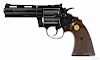 Colt Diamondback revolver, .22 caliber, blued with walnut grips, 4'' round barrel, serial #D93202.