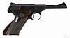 Colt Woodsman Sport semi-automatic pistol, .22 long rifle caliber, with brown plastic grips