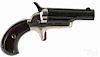 Contemporary Colt single-shot derringer pistol, .22 short caliber, retaining its original box