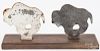 Pair of cast iron buffalo targets, early 20th c., on a stand, 7 1/2'' h., 15'' w.