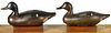 Pair of carved and painted blue wing teal duck decoys, mid 20th c., branded HF, 12 1/2'' l.