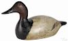 Evans factory carved and painted canvasback duck decoy, early 20th c., stamped Evans on bottom