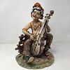 Capodimonte Male statue playing the Guitar