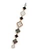 VAN CLEEF & ARPELS,   MOTHER-OF-PEARL AND ONYX 'ALHAMBRA' WRISTWATCH