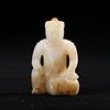 A WHITE JADE 'FIGURE' CARVING