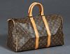 Louis Vuitton Keepall 45 Travel Bag, in a monogram coated canvas, with vachetta leather accents and golden brass hardware, accompanied with luggage ta