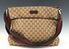 Gucci Front Slip Pocket Messenger Bag, in beige monogram canvas with silver hardware, opening to a dark canvas lined interior with a side zipper pocke