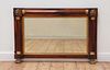 A Regency rosewood and parcel-gilt overmantel mirror,