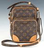 Louis Vuitton Amazone Shoulder Bag, in brown monogram coated canvas with vachetta leather accents and golden brass hardware, opening to a brown canvas