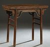 Chinese Carved Elm Side Table, 18th c., the reeded rectangular top over cylindrical legs with pierced brackets, joined by cylindrical stretchers, H.- 