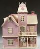 Large Child's Doll House, 20th c., with mansard rooves and ten rooms of furniture, H.- 39 in., W.- 29 1/2 in., D.- 15 1/2 in.