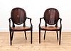 A pair of mahogany hall chairs,
