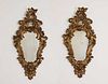 A pair of rococo wall mirrors,