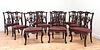 A set of twelve mahogany dining chairs in the manner of Gillows,