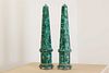 A pair of malachite obelisks,